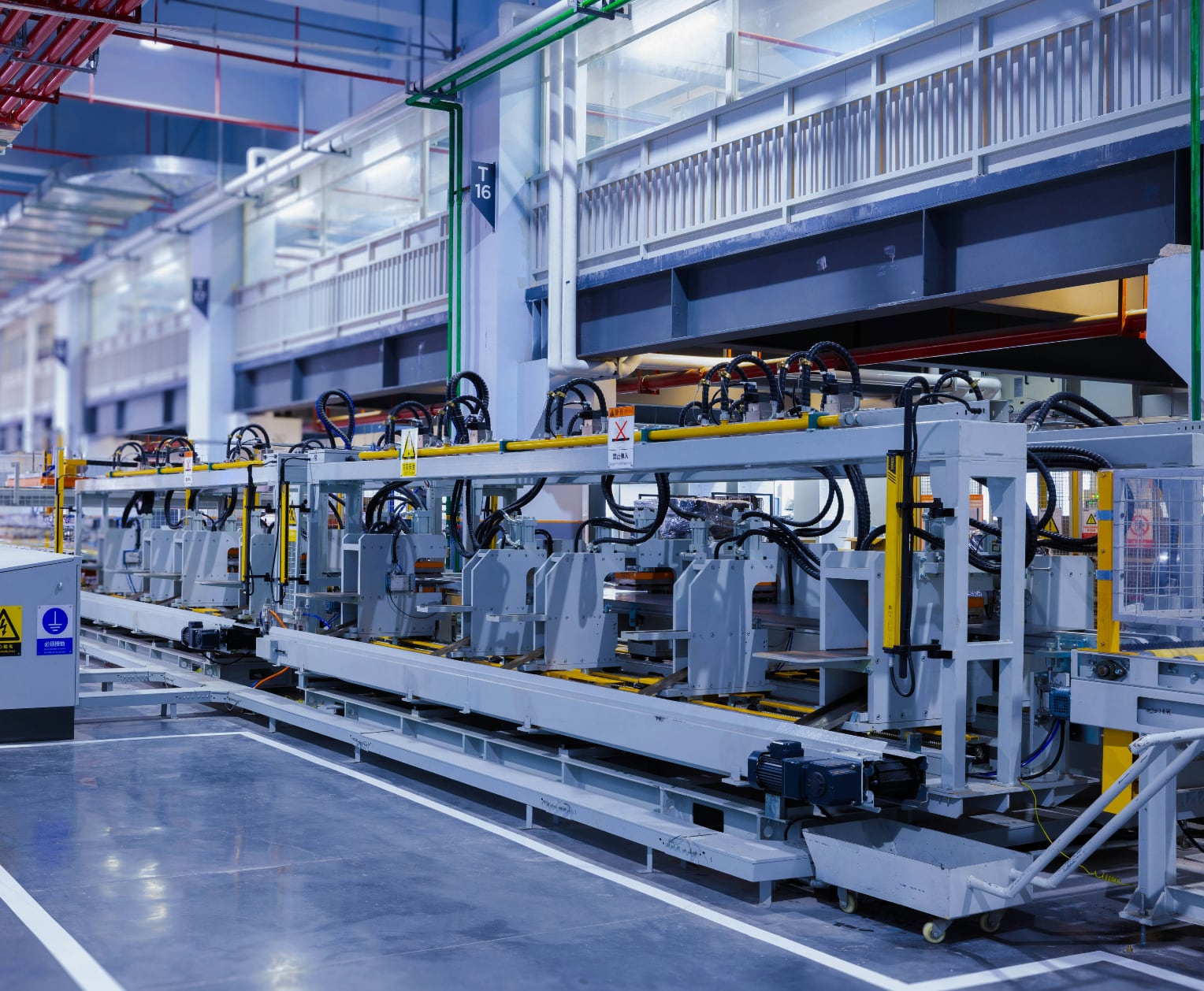 modern clean manufacturing factory floor showing large machinery