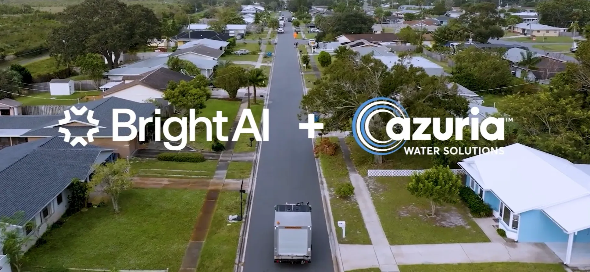 Aerial view of a suburban neighborhood with a truck driving down the street. The image features logos: BrightAI and Azuria Water Solutions with a plus symbol between them.